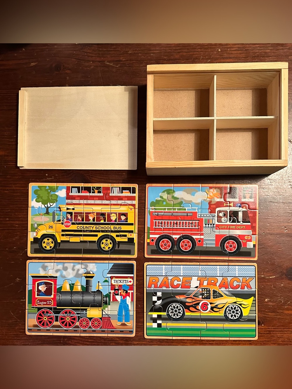 Melissa & Doug • Vehicles • wooden puzzles • in wooden, divided box